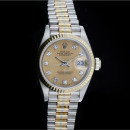 Rolex Lady Datejust (26mm) Ref.: 69179B in Tridor mit champagner Diamant-Zifferblatt aus 1985 Artikelnummer:LADYDATEJUST00051 von Rolex